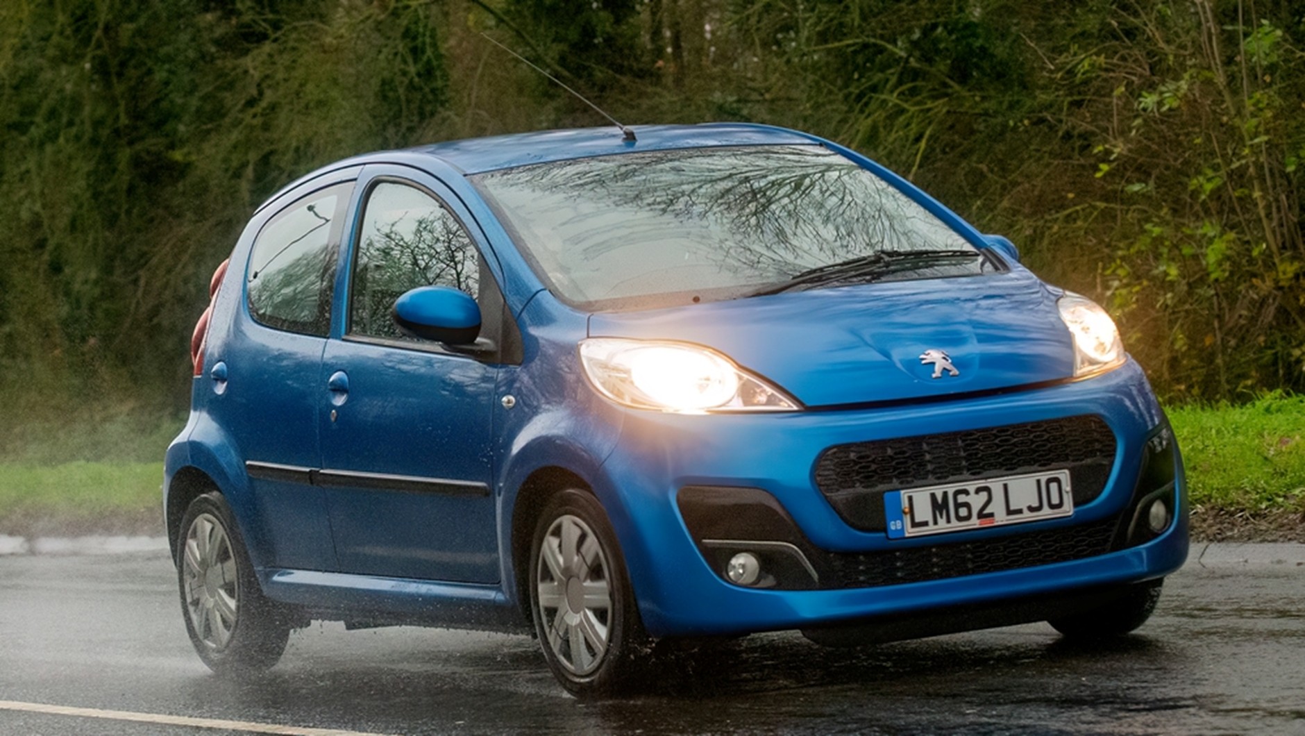 Peugeot 107, a compact and economical car with affordable insurance rates for first-time drivers.